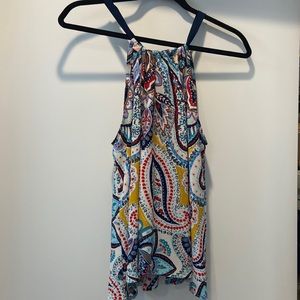 Loose fitting paisley top.